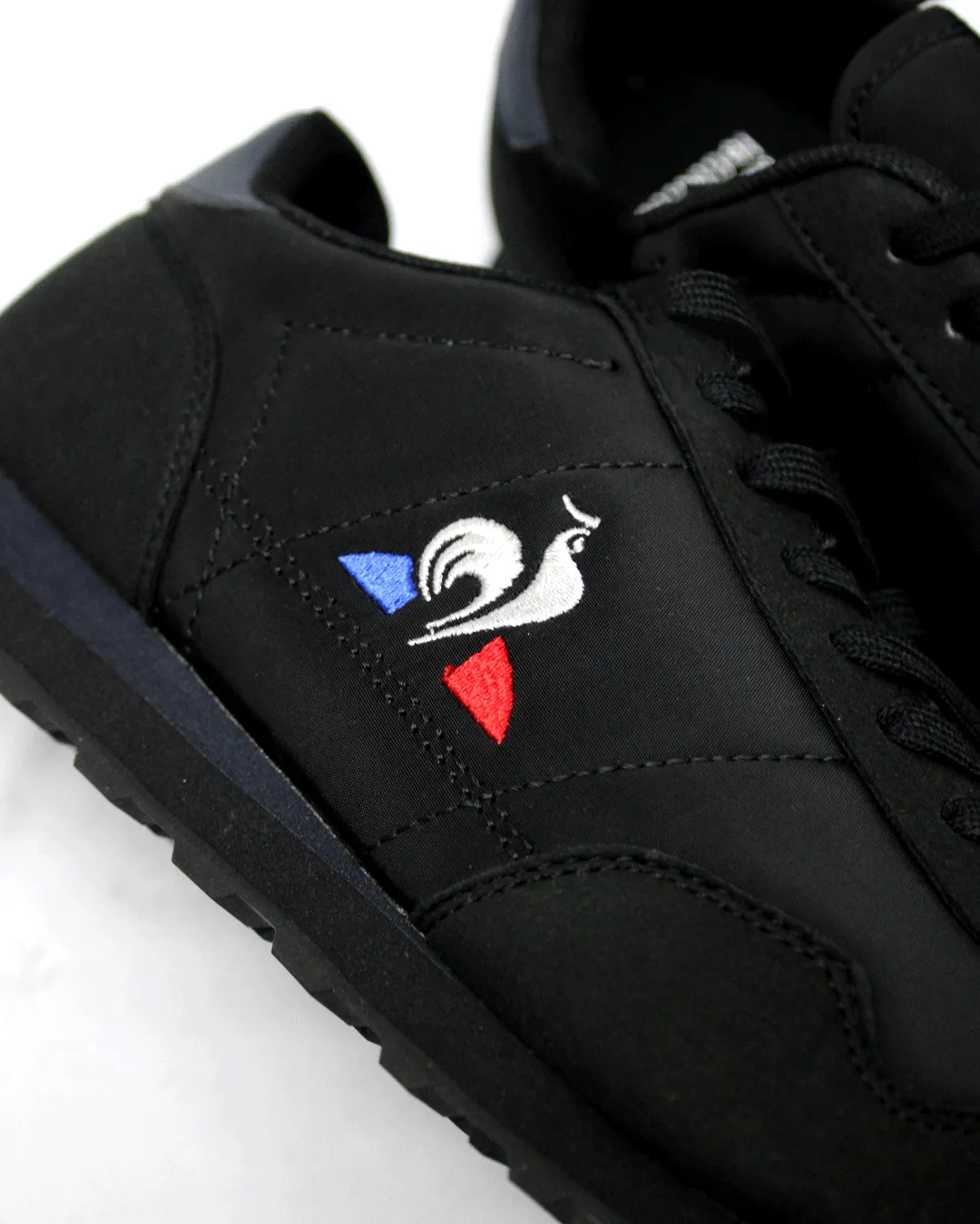 Lecoq Sportif Astra Sports Triple Black